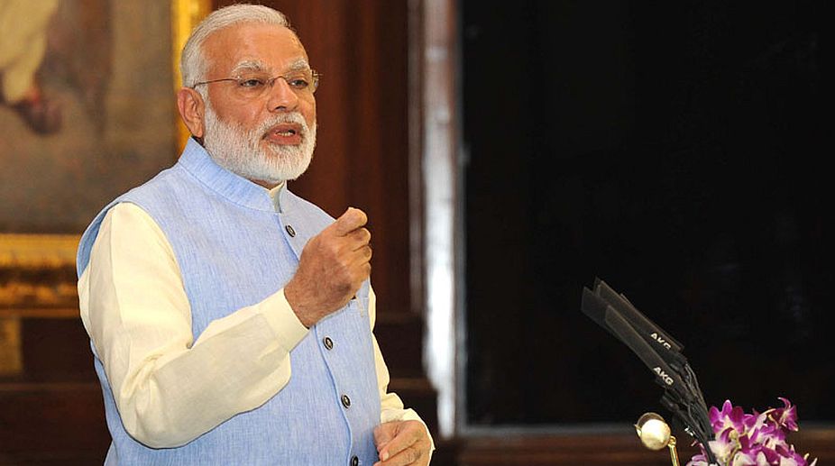 Don’t hide taxes of clients at country’s cost, PM Modi tells CAs