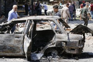 18 killed as car bombers strike Damascus