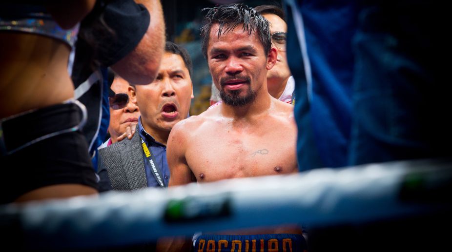 Trainer Freddie Roach urges Manny Pacquiao to quit pro-boxing