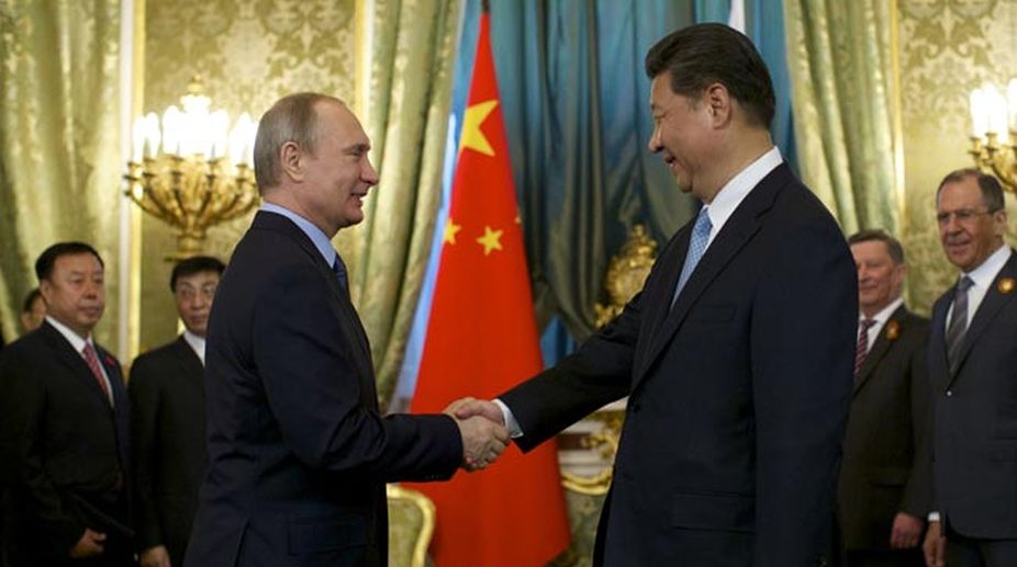 Putin and Xi talking N Korea, trade at Kremlin