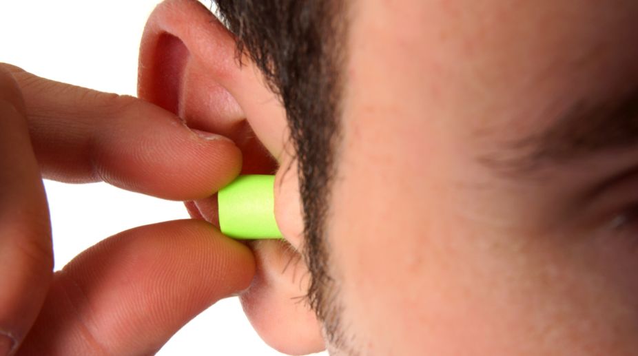 New earplugs let you answer phone calls with your smile!