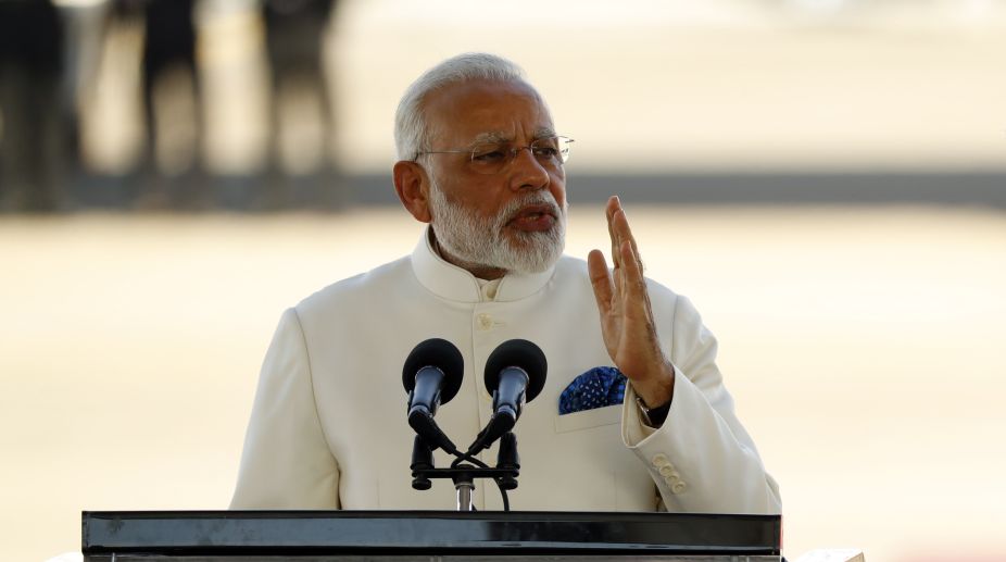 Mandatory to implement Paris agreement consensus: Modi