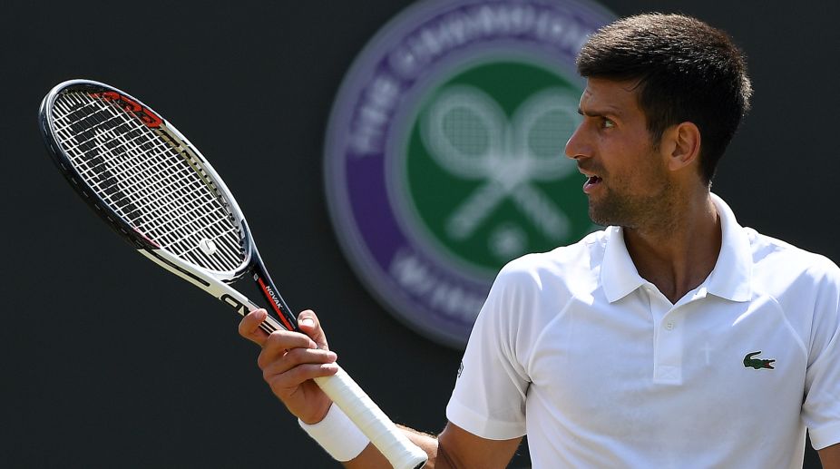 Novak Djokovic breezes in Wimbledon heat