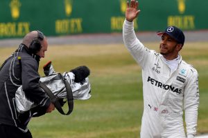 British Grand Prix: Lewis Hamilton beats Ferrari duo to take pole