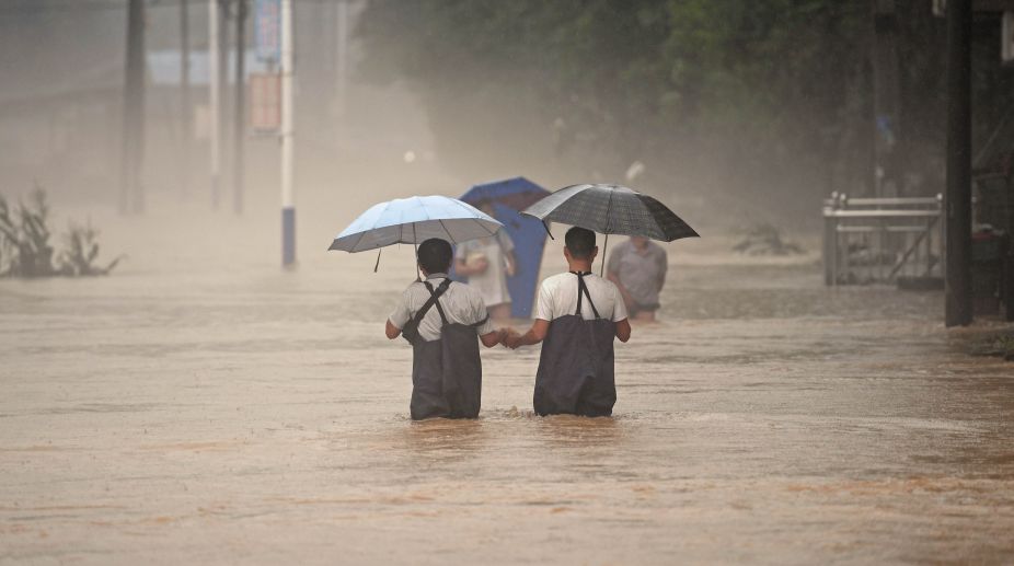 10 people killed as heavy rain, floods hit China
