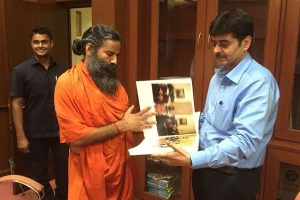 Pictorial book on Pranab Mukherjee’s presidency overwhelms Baba Ramdev