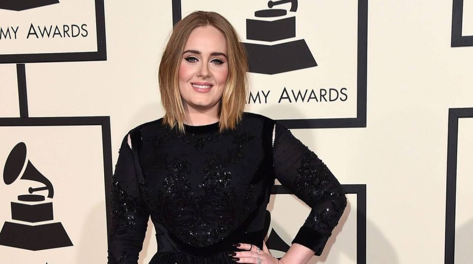 Adele does charity work on music break