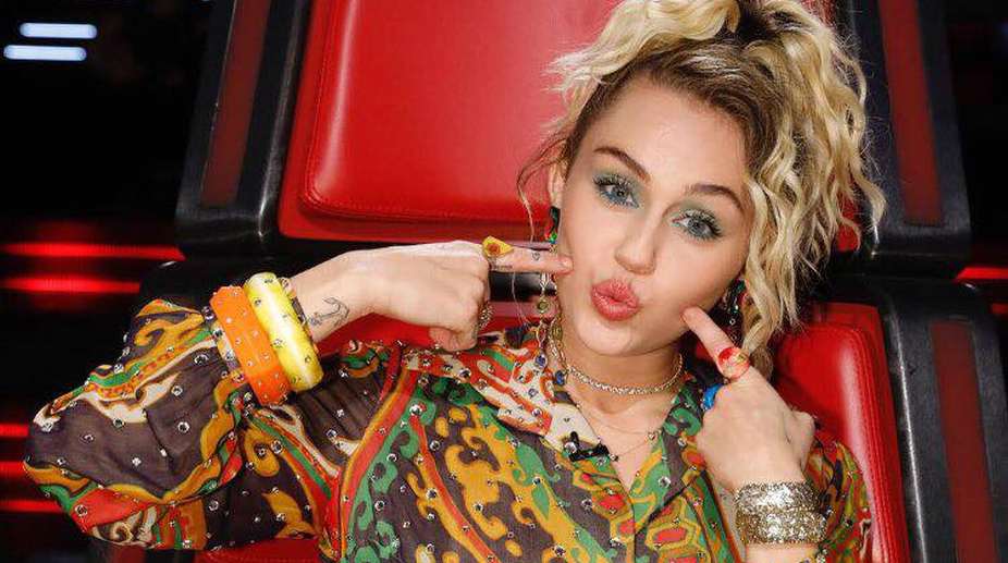 Miley Cyrus denies pregnancy, slams ‘rude’ fans