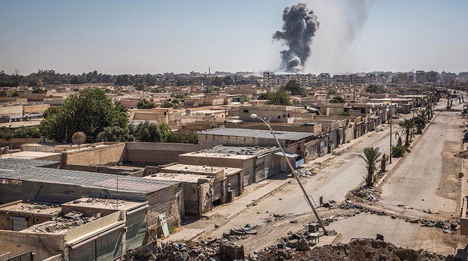 US-led airstrikes kill 14 in Syria