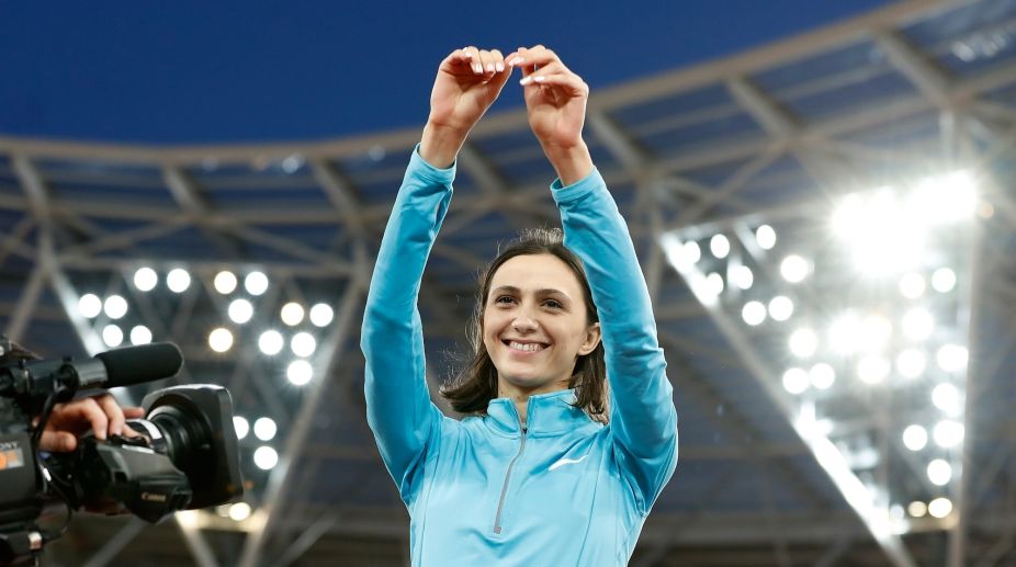 Russia’s Lasitskene retains women’s high jump world title