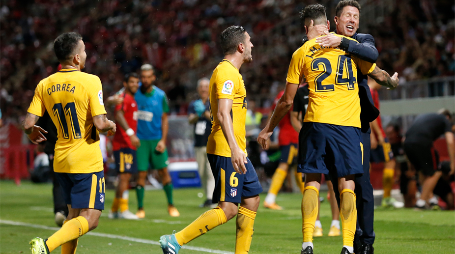 La Liga: Atletico Madrid defy Antoine Griezmann red card to salvage Girona draw
