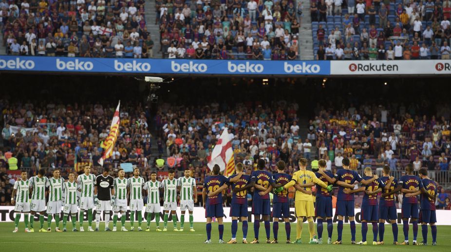 Barcelona honour terror attack victims in Betis win