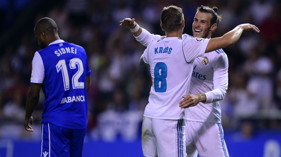 Real Madrid cruise to win at Deportivo in La Liga opener