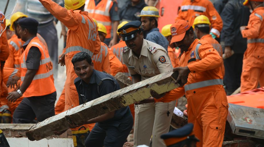 8 killed as portion of TN transport corporation building collapses