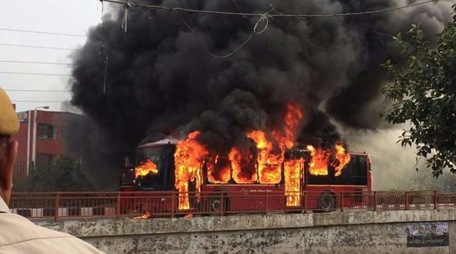 Two train coaches set ablaze, buses torched in Delhi: Police