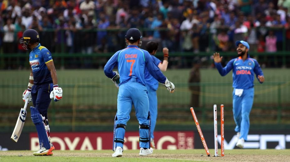 Dhoni, Bhuvi guide India to three wicket victory over Sri Lanka