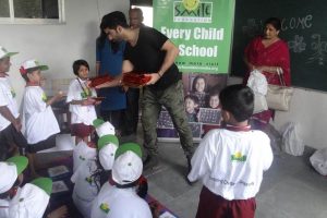 Taaha Shah encourages child education