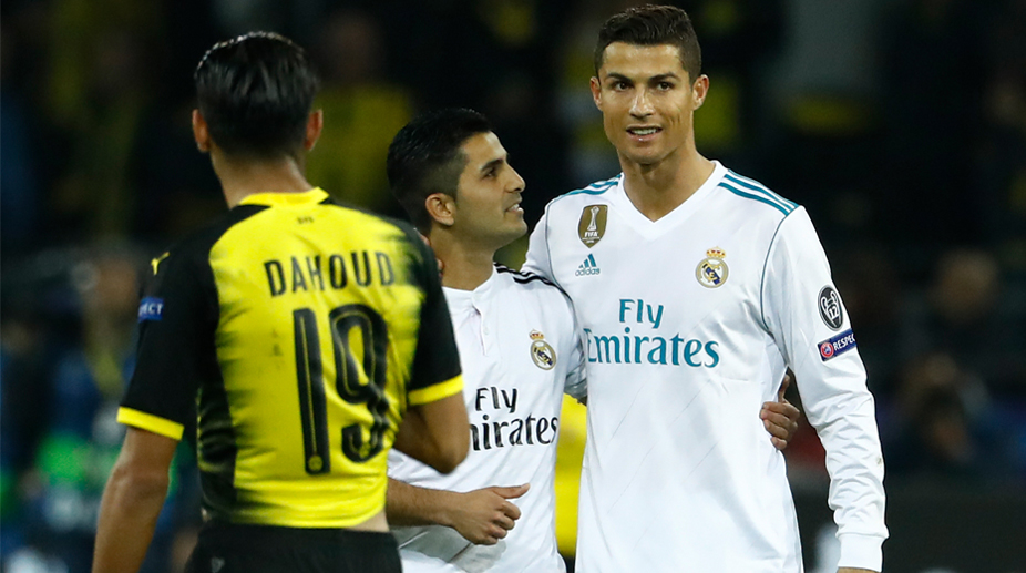 Cristiano Ronaldo hugs pitch-invading fan after Borussia Dortmund game