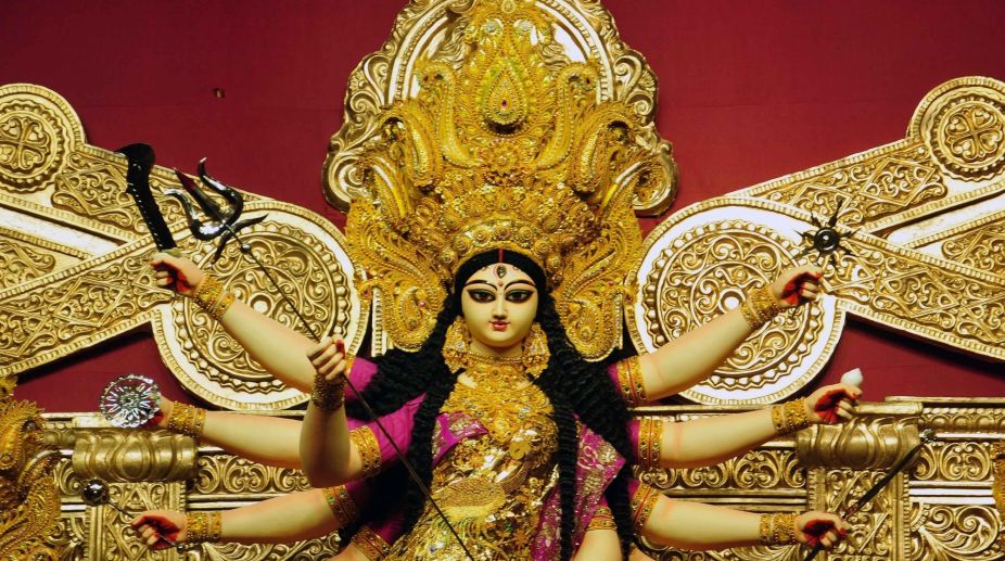 Durga idol in gold sari attracts thousands of devotees in Kolkata