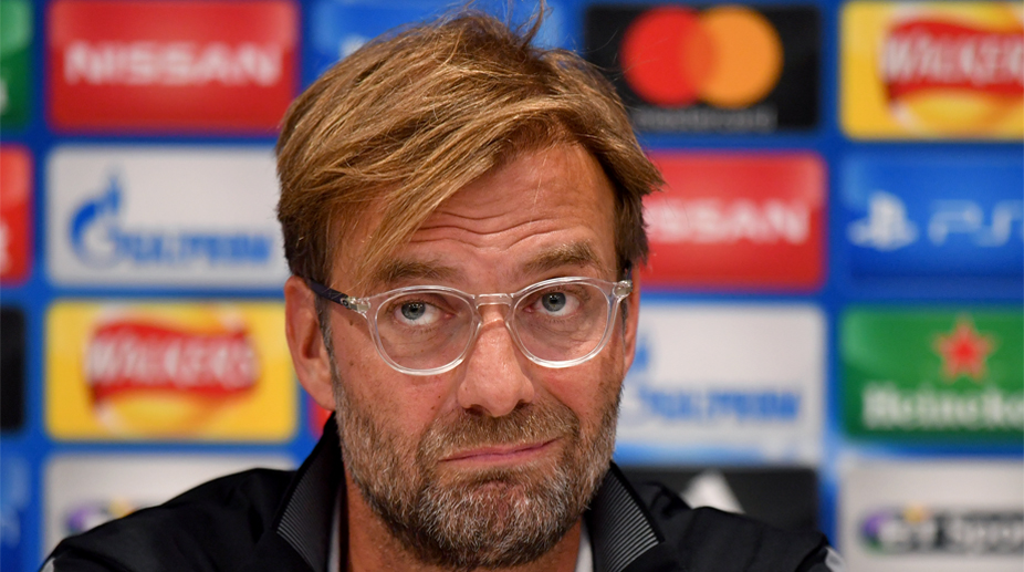 Klopp apologises for throwing water bottle, backs keeper Mignolet