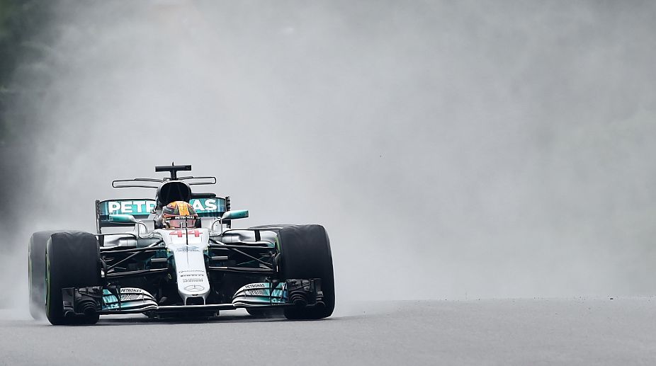Malaysian GP: Hamilton takes pole position, Vettel suffers setback