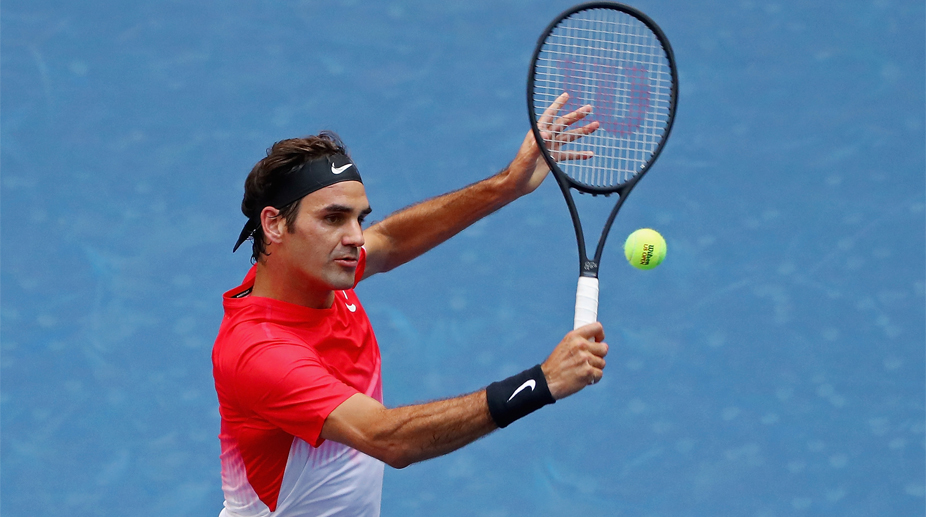 Federer knocks out Lopez in straight sets, moves on to US Open