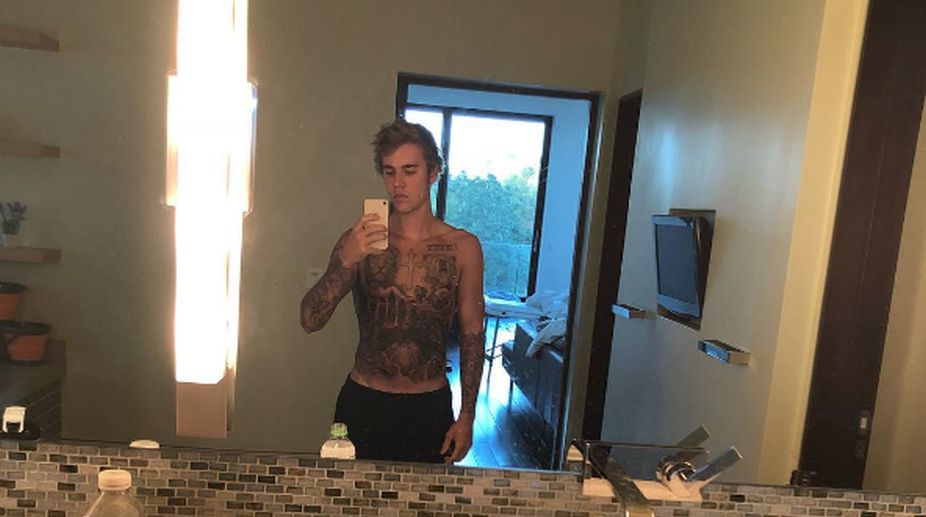 Justin Bieber gets entire torso inked