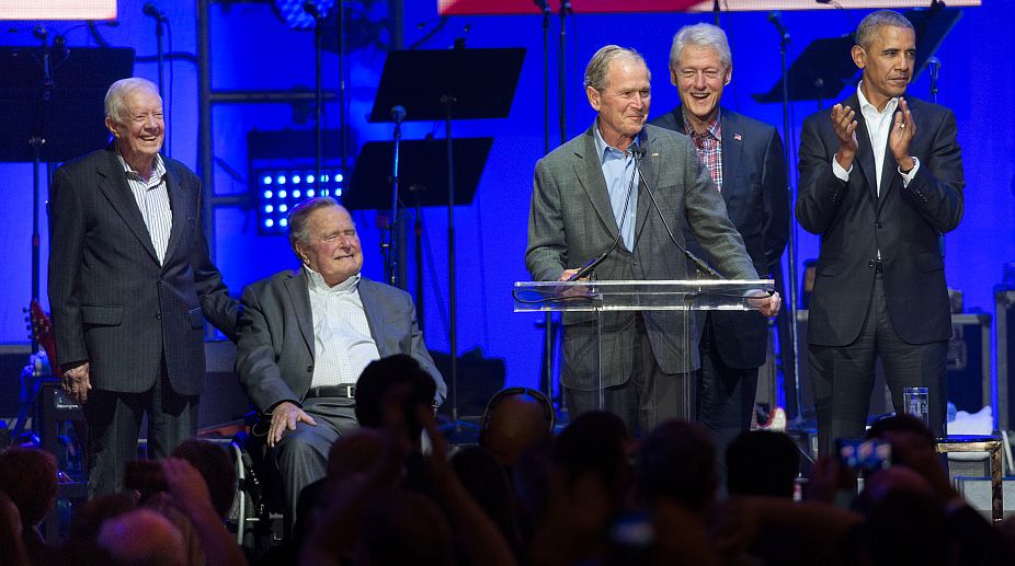Five ex-US Presidents share stage at hurricane relief concert