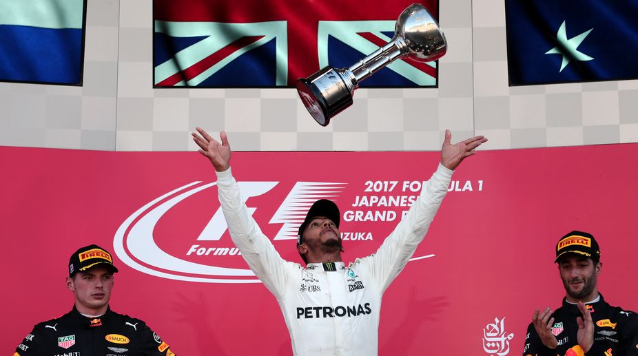 Japanese GP: Lewis Hamilton beats Max Verstappen; Sebastian Vettel retires