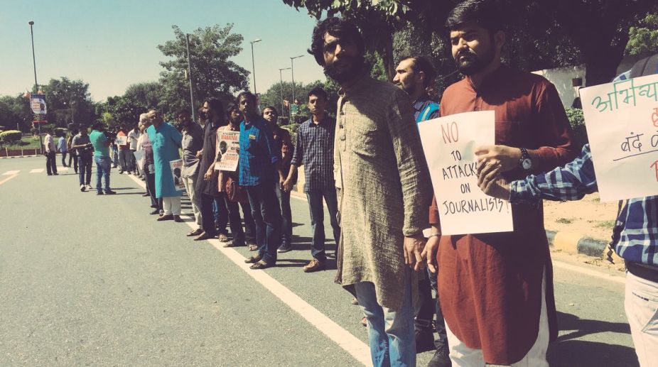 Journalists form human chain to protest rising violence against them