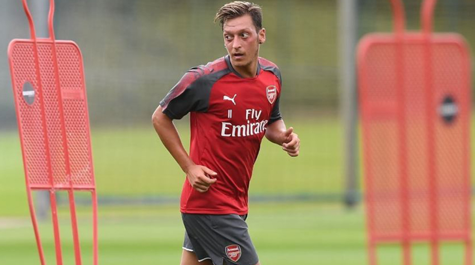 Watch: Arsenal midfielder Mesut Ozil sweats it out in gym