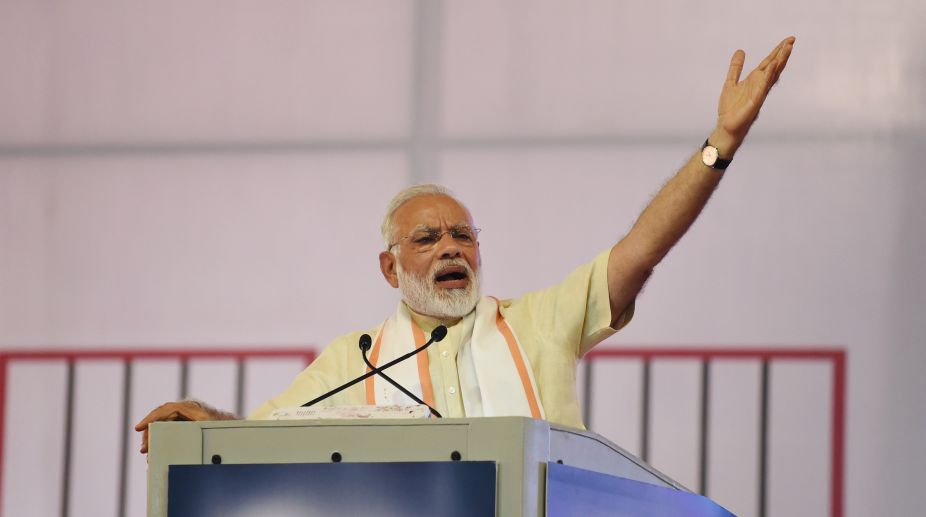 Modi dares Cong to contest Gujarat polls on development plank