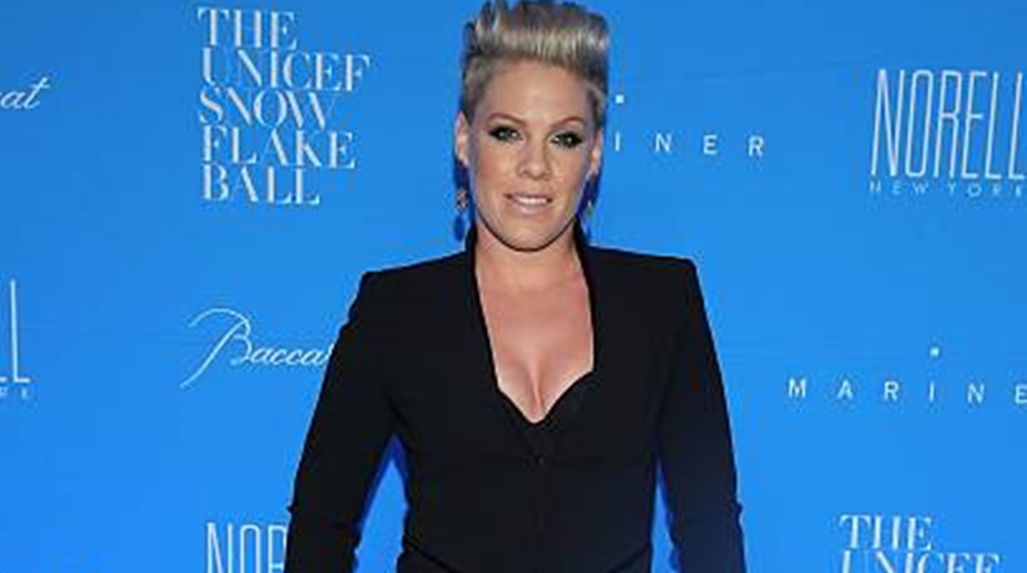 Pink says Christina Aguilera tried to punch her