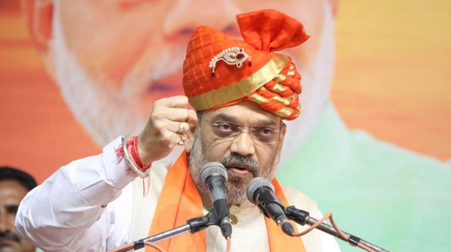 Gujarat polls: Shah dares Rahul to reveal quota formula for Patidars