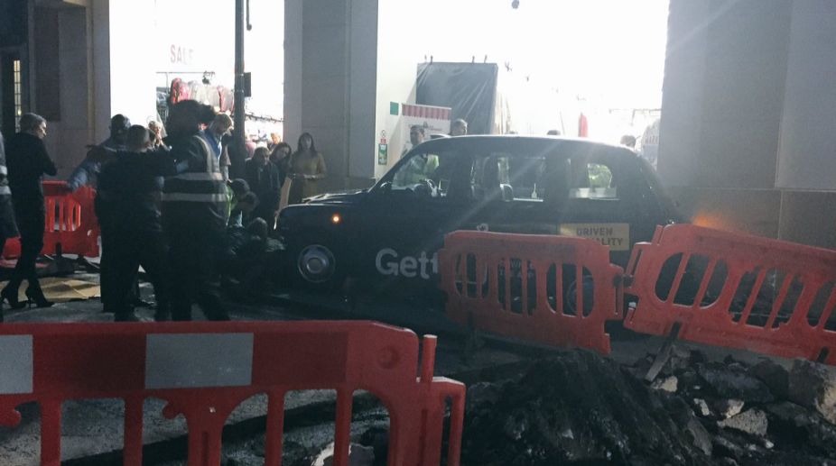 Several injured as taxi crashes into crowd in London