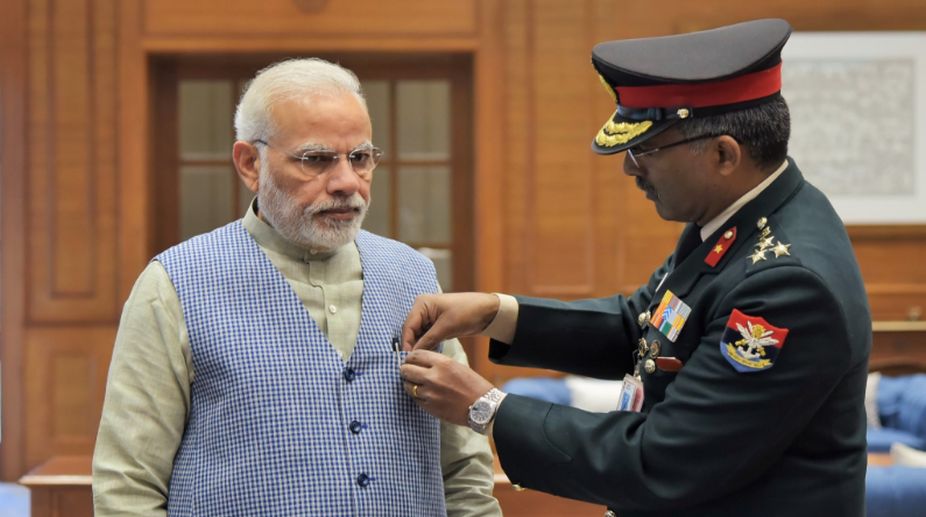 PM Modi makes cashless contribution to soldiers on Armed Forces Flag Day