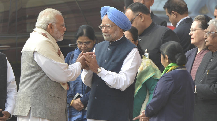 Manmohan greets Modi as leaders pay homage to Parliament attack victims