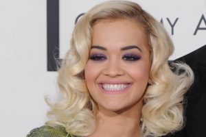 Rita Ora slammed for new gold tooth