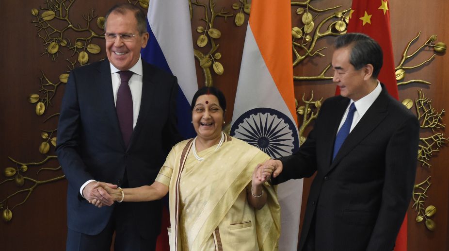 Sushma holds trilateral meet with Chinese, Russian Foreign Ministers