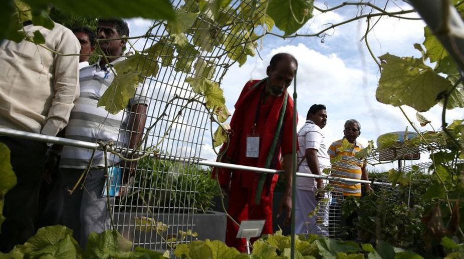 Indian farmers learn about Singapore-style planning