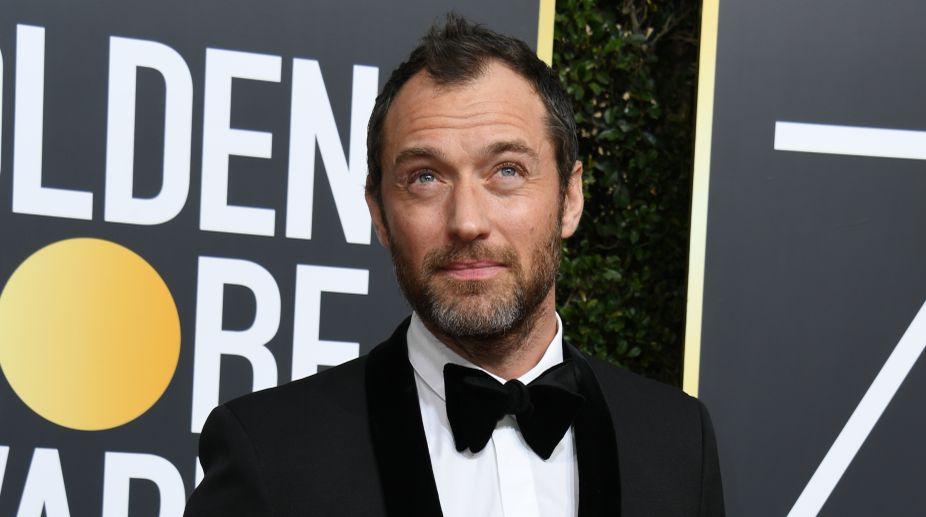 Jude Law also supported the movement by attending the 75th Golden Globes dressed in a black tuxedo (Photo Credits: AFP) img