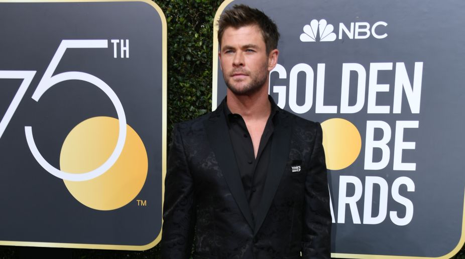 'Thor' aka Chris Hemsworth stole the show with his black outfit all the while supporting the movement (Photo Credits: AFP) img