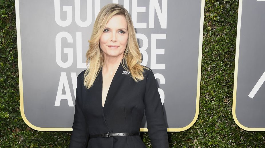 Michelle Pfeiffer walked the red carpet in style in her black closed jacket. Michelle has been an advocate for human rights and has raised her voice in the past against sexual harassment (Photo Credits: AFP) img