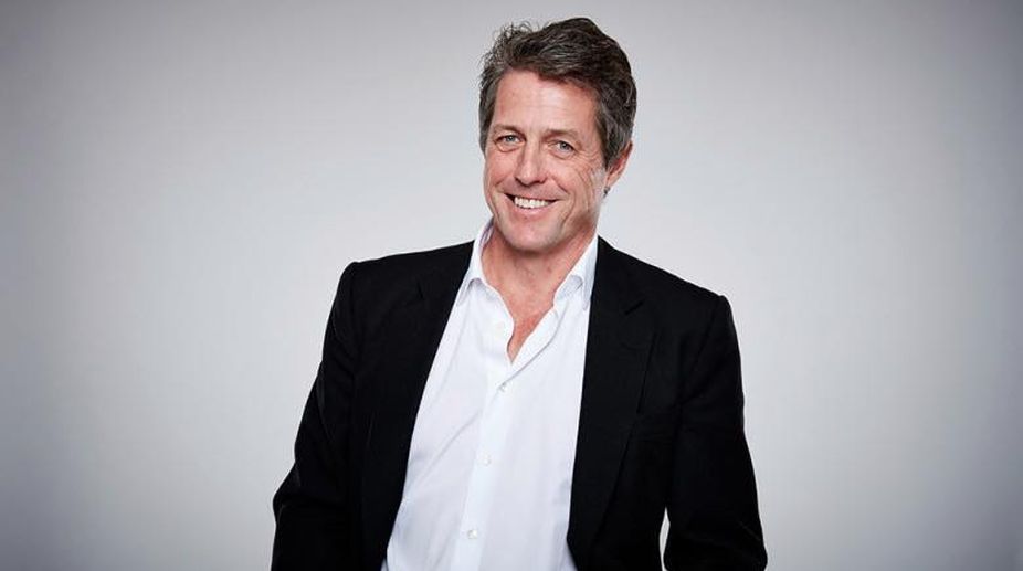 Hugh Grant says his wife was kidnapped in Paris