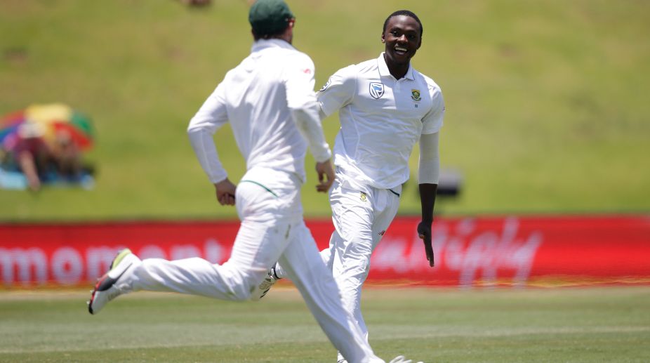 South Africa's Kagiso Rabada celebrates the dismissal of India's Rohit Sharma (not in picture) during the fifth day of the second Test cricket match between South Africa and India at Supersport cricket ground on January 17, 2018 in Centurion, South Africa. (Photo Credit-AFP)