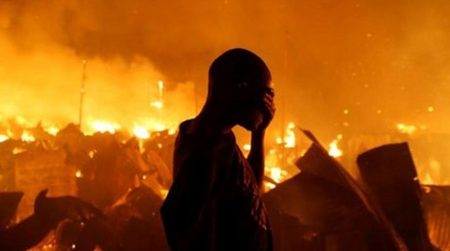 3 dead, thousands homeless after night fire in Kenyan slum