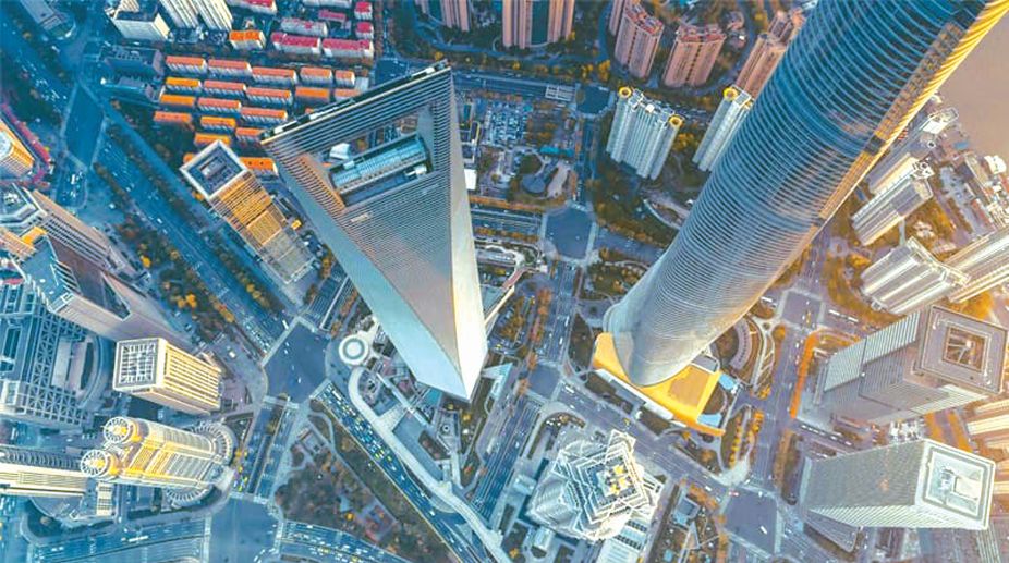 The building that is shaped like a bottle opener