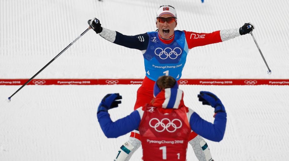 Bjoergen becomes most successful winter Olympian with 14 medals