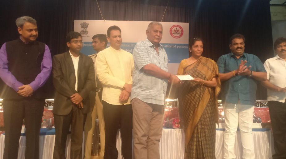 Operation Seabird: Sitharaman distributes cheques to 30 displaced families