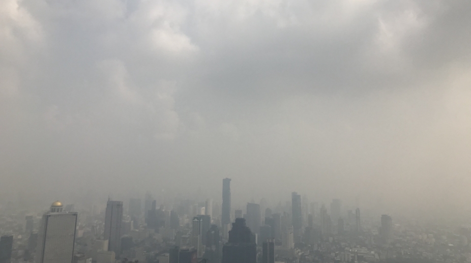 Beijing issues orange smog alert